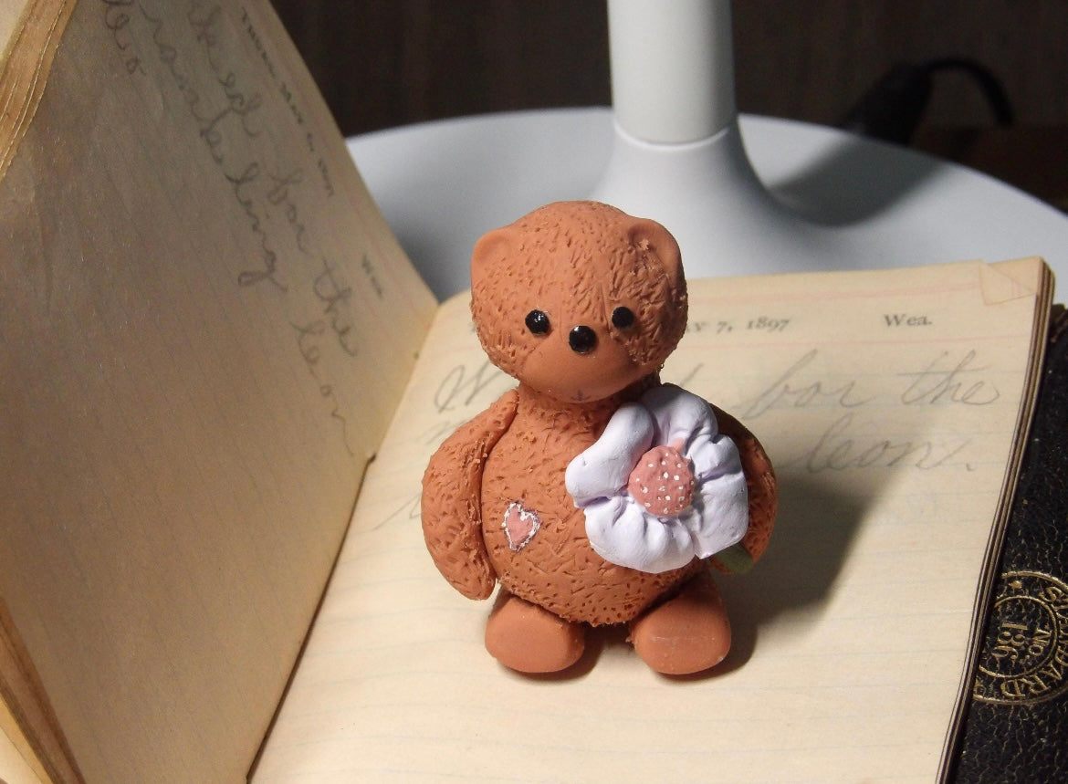 Teddy Bear Figurine With Flower